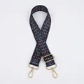 Detail of adjustable blue ethnic floral strap with gold metal buckle and swivel hooks - Navy Blue Small Flower (No.35) Gold Buckle