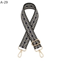Macro detail of black and white geometric pattern wide strap with gold metal hooks - A-29 Black Blue (Silver Buckle)