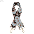 Close-up of geometric jacquard shoulder strap with gold-tone hardware and buckle - Z-5 Silver Silk Black Light Blue (Silver Buckle)