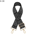 Close-up of geometric jacquard bag strap with gold metal hooks and adjustable slider - Silver Clasp / Black and Grey Geometric Jacquard (X-30)