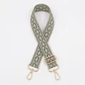 Close-up of adjustable woven shoulder strap with green geometric diamond pattern and gold hooks - Army Green (X-8)