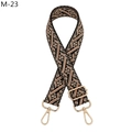 Close-up of ethnic geometric jacquard bag strap with gold metal lobster clasps - M-23 Black Meat Powder