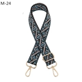 Detailed view of ethnic jacquard strap with navy floral pattern and gold metal lobster clips - M-24 Peacock Blue