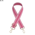 Detail view of adjustable pink and white striped nylon bag strap with gold metal hooks - Gold Buckle / Rose Red