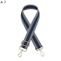 Detail of adjustable navy and white striped bag strap with premium gold metal hooks - Gold Buckle / Blue