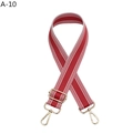 Detail of red and white striped canvas bag strap with light gold metal lobster clasps - Gold Buckle / Red