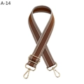 Close-up of caramel brown woven bag strap with white stripes and gold metal clips - Gold Buckle / Brown