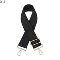 Detail of black wide bag strap with textured geometric pattern and gold hardware - Black