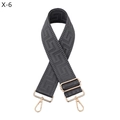 Detail showing grey Greek key pattern webbed bag strap with gold metal hardware - Dark Gray