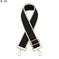 Detail of black and white Greek key pattern bag strap with golden metal swivel hooks - Black with Beige Edge (X-25)