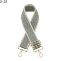 Detail of adjustable woven bag strap with green geometric jacquard and gold hardware - Matcha Green (X-28)