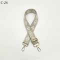 Close-up of adjustable beige and grey geometric diamond pattern jacquard bag strap - C-24 Silver Wire Gray