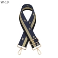 Detail of navy woven bag strap with golden star patterns and adjustable metal buckle - W-19 Blue Black Star / Silver Clasp
