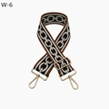 Macro shot of the adjustable gold metal lobster clasp and geometric woven bag strap - W-6 Brown Black Chain Silver Buckle