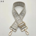Detail of adjustable geometric jacquard shoulder strap with gold metal swiveling hooks - Beige Grey Gold Buckle (A-8)