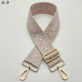 Detailed close-up of wide jacquard bag strap with geometric rhombus pattern and gold metal hooks - Pink Gold Buckle (A-9)