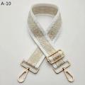 Detail view of bohemian jacquard wide strap with geometric patterns and gold swivel hooks - White Edge Khaki Gold Buckle (A-10)