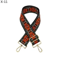 Macro detail of ethnic style woven bag strap with golden hardware and floral patterns - Black Orange Geometric(X-11)