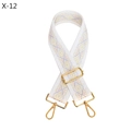 Close-up of geometric diamond pattern embroidery on white adjustable purse strap - White (Gold Buckle)