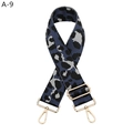 Macro detail of adjustable leopard print bag strap with polished gold-tone metal hardware - A-9 Blue Gray