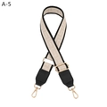 Close-up of beige Greek Key pattern bag strap with black leather ends and gold hardware - Black Khaki and Black Leather (A-5)