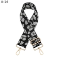 Detail of grey leopard print woven strap with gold metal lobster clasps and buckle - A-14 Black Gray