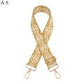 Detail of adjustable geometric diamond pattern bag strap with gold metal lobster clasps - Yellow (A-5)