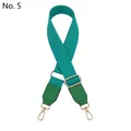 Detail of adjustable turquoise fabric bag strap with green leather ends and gold metal hooks - Silver Clasp / Emerald Green