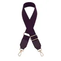 Detail of dark purple adjustable canvas bag strap with leather ends and golden buckles - Deep purple