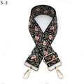 Vue détaillée d'une bandoulière brodée ethnique avec attaches en métal doré réglables - Floral Noir Matcha Vert Orange (S-3)