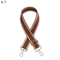 Detail of adjustable brown and white chevron woven strap with golden lobster clasps - Dark Brown