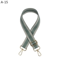 Macro detail of adjustable grey-green herringbone strap with gold metal lobster clasps - Matcha Green