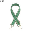 Macro detail of adjustable green herringbone woven bag strap with gold metal lobster clasps - Light Green