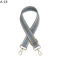 Detail of grey and light blue herringbone woven bag strap with golden lobster claws - Grey Blue
