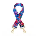 Detailed view of adjustable wide shoulder strap with vibrant floral print and gold metal clips - No.6 Blue Pink Leaves