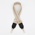 Close-up of adjustable beige strap with gold stripes and high-quality lobster clasps - Off-White Gold Stripes with Black Leather (No.5)
