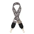 Detail of adjustable leopard print bag strap with black leather ends and golden metal hooks - Beige Black Leopard
