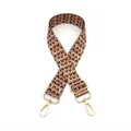 Detail of adjustable wide shoulder strap with orange geometric pattern and gold hardware - No. 11 Black Orange