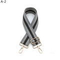 Detail of adjustable wide canvas shoulder strap with grey stripes and gold metal hardware - A-2 Dark Gray