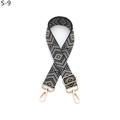 Close-up of geometric diamond pattern woven shoulder strap with gold metal lobster clasps - S-9 Black