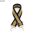 Macro detail of adjustable wide woven bag strap with ethnic pattern and gold buckles - A-13 Black Khaki