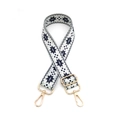 Detail of geometric star pattern strap with gold metal lobster clasps and buckles - Blue