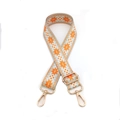 Detail of orange and grey geometric star pattern strap with gold metal hooks - Orange