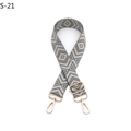 Close-up of adjustable woven guitar strap for handbags with geometric diamond patterns - S-21 Dark Gray