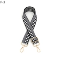 Close-up of black and white checkered adjustable bag strap with gold metal buckles - Silver Clasp / F-3 Black White Checker