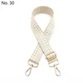 Dettaglio della tracolla intrecciata regolabile con ganci in metallo dorato lucido - Fibbia Oro / N. 30 Beige