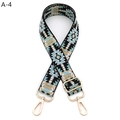 Detail of colorful jacquard guitar strap with ethnic geometric patterns and gold metal buckles - A-4 Black Light Green Khaki