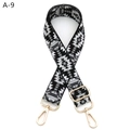 Detailed view of adjustable woven bag strap with geometric patterns and gold metal hooks - A-9 Black Dark Gray