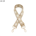 Vue détaillée de la sangle géométrique café et blanc avec boucle en métal doré - Fermoir en Argent / Soie Dorée Kaki (A-13)