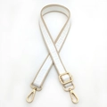 Adjustable geometric pattern bag strap in beige with gold metal hooks and hardware - Khaki and White